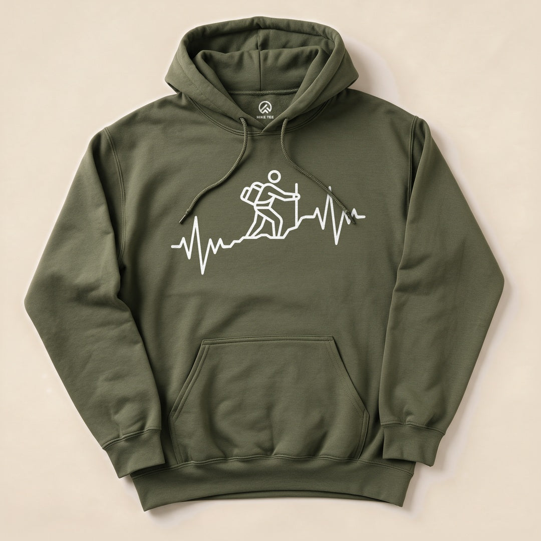 A graphic t-shirt, the "Hiking Heart Rate Hoodie" features a white heartbeat line and a hiker silhouette on an olive green background.