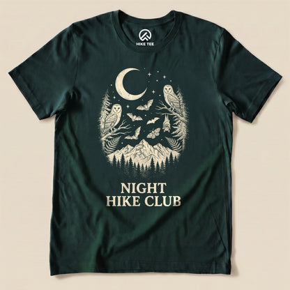 Forest Night Hike Club Shirt with a crescent moon, owls, bats and mountains graphic