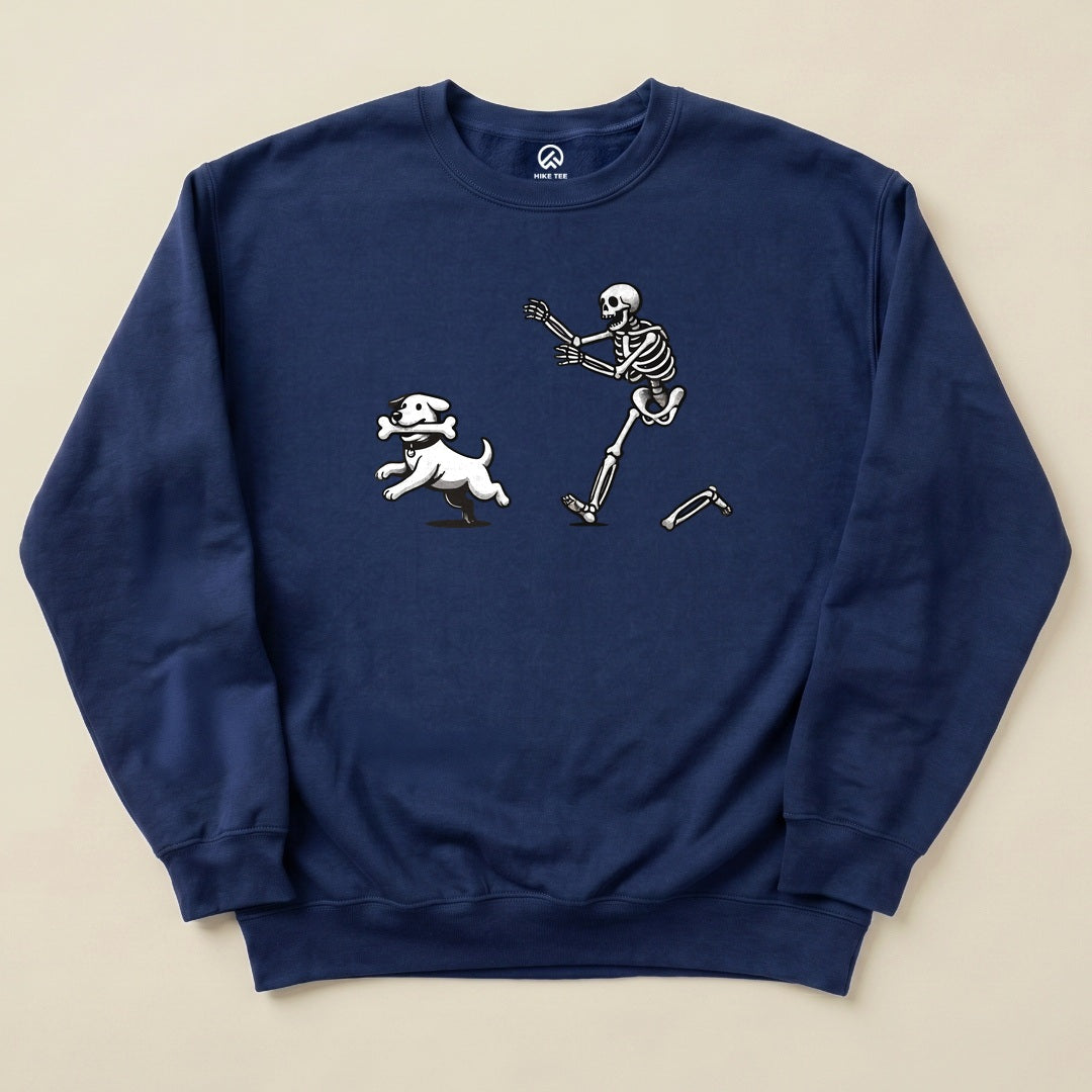 A navy blue "Skeleton and Dog Sweatshirt" features a playful graphic of a skeleton chasing a running dog, emphasizing humor and adventure.