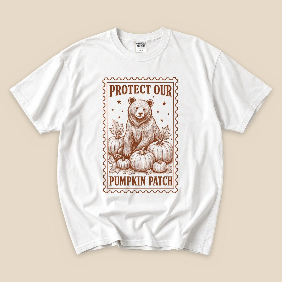 White Protect Our Pumpkin Patch T-Shirt with a vintage bear guarding a pumpkin patch graphic