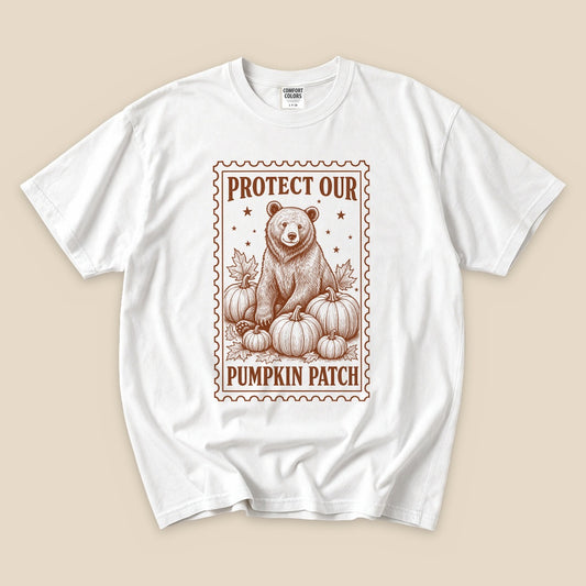 White Protect Our Pumpkin Patch T-Shirt with a vintage bear guarding a pumpkin patch graphic