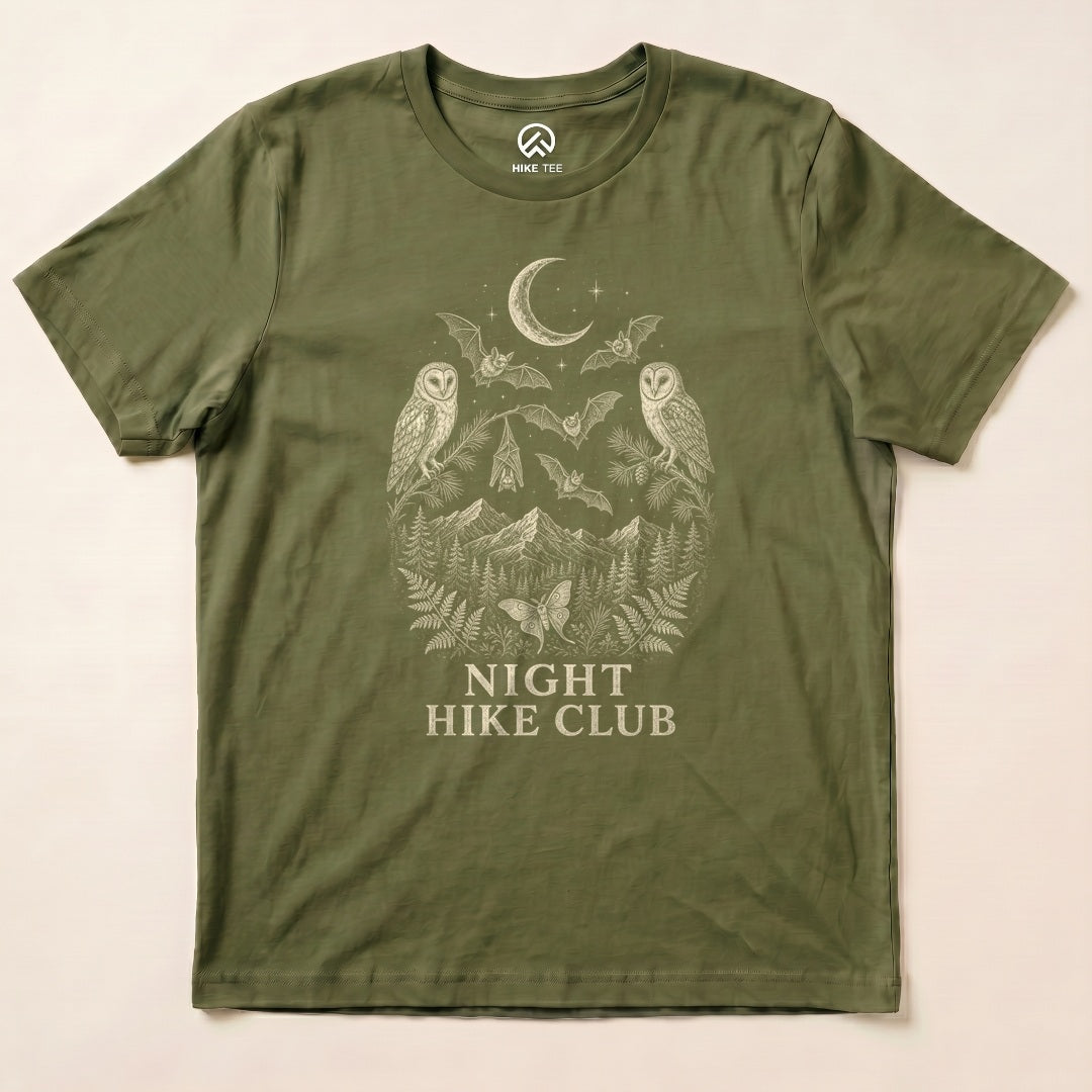 Military Green Night Hike Club Engraved Shirt with a night forest scene with a moon, owls, moths and mountains in engraved style graphic