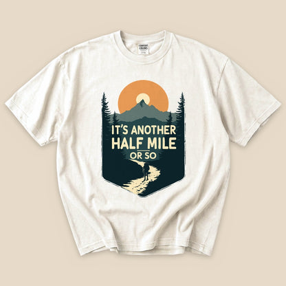 Ivory Half Mile T-Shirt with an It's Another Half Mile or So mountain hiker graphic