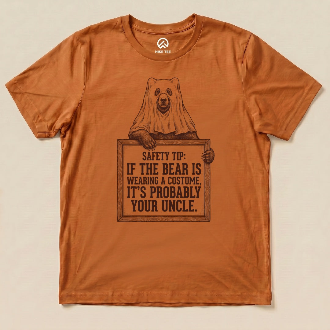 Autumn Bear Safety Tip Shirt with a bear in a ghost sheet holding a safety tip sign graphic