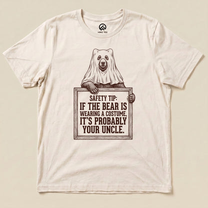 Natural Bear Safety Tip Shirt with a bear in a ghost sheet holding a safety tip sign graphic