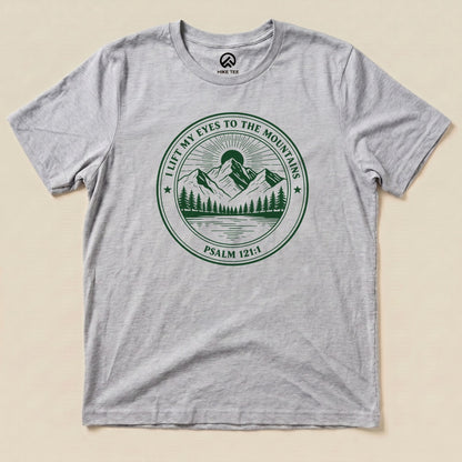 Athletic Heather I Lift My Eyes to the Mountains Shirt with a mountain lake badge with Psalm 121:1 graphic