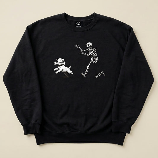 A black Skeleton and Dog Sweatshirt featuring a playful graphic of a skeleton running alongside a dog.