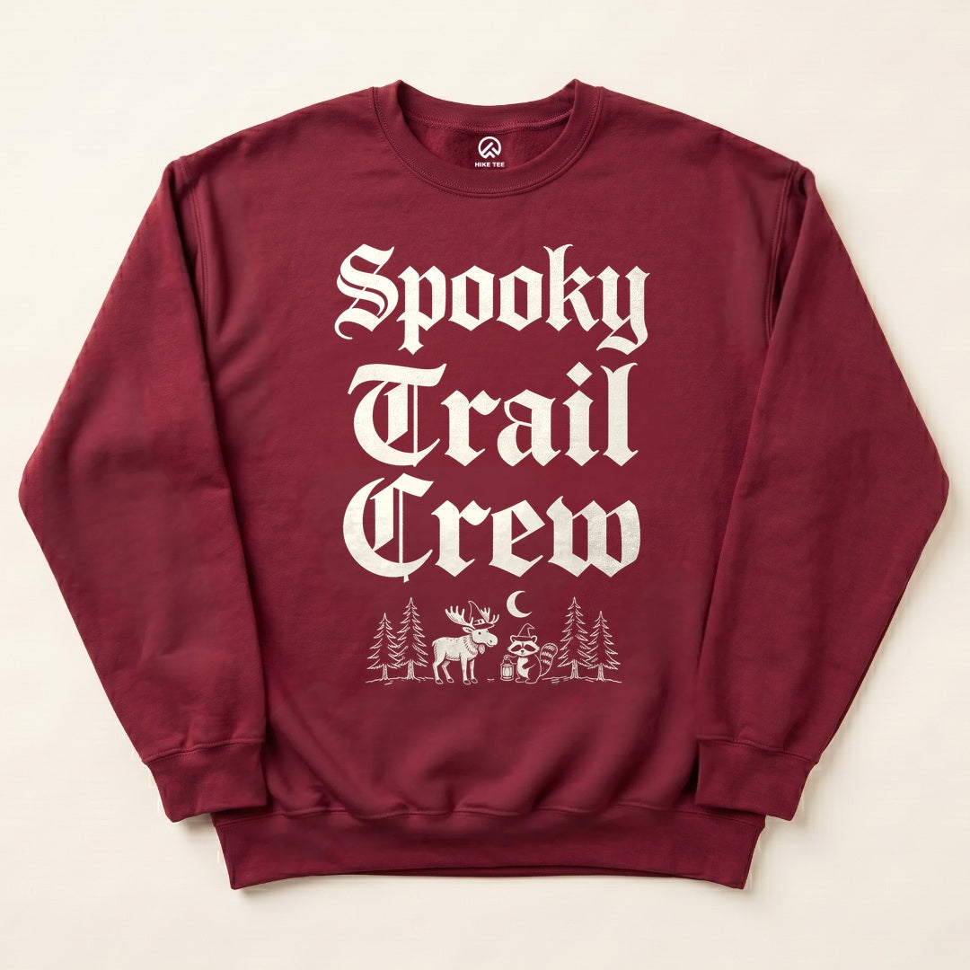 Maroon Spooky Trail Crew Sweatshirt with gothic Spooky Trail Crew lettering with a moose and a raccoon graphic