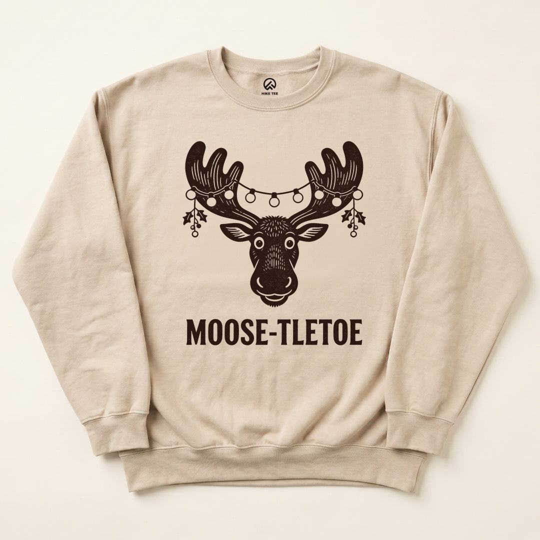 Sand Moose-tletoe Sweatshirt with a moose wearing string lights and mistletoe graphic