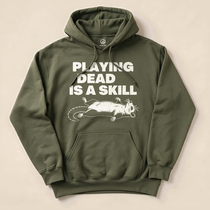 Military Green Playing Dead Possum Hoodie with a possum playing dead graphic