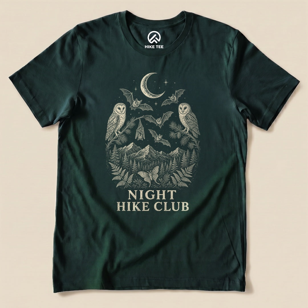 Forest Night Hike Club Engraved Shirt with a night forest scene with a moon, owls, moths and mountains in engraved style graphic