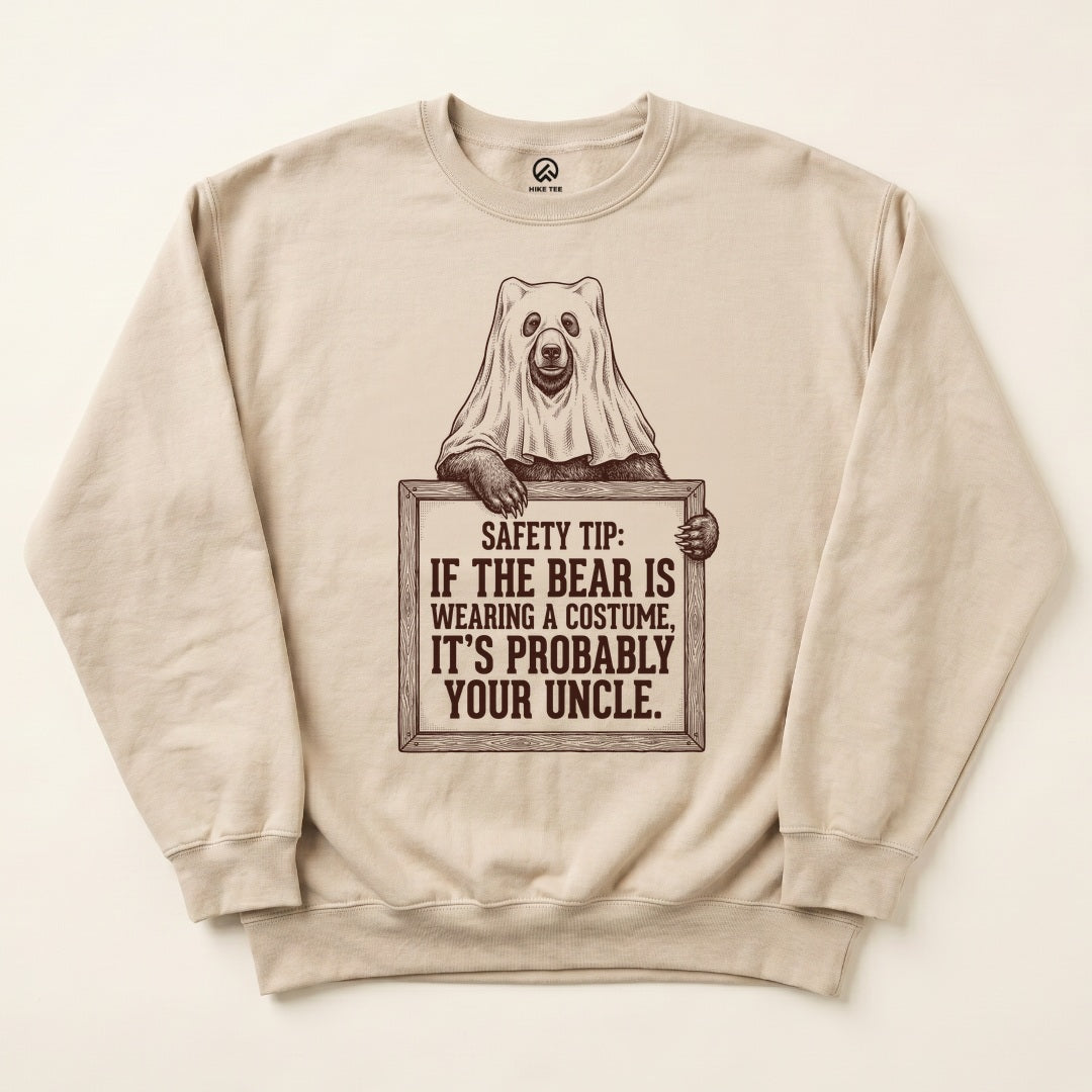 Sand Bear Safety Tip Sweatshirt with a bear in a ghost costume holding a safety tip sign graphic