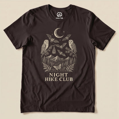 Brown Night Hike Club Engraved Shirt with a night forest scene with a moon, owls, moths and mountains in engraved style graphic