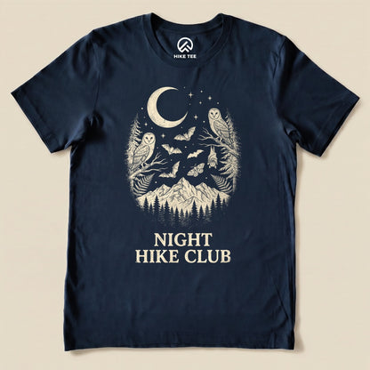 Navy Night Hike Club Shirt with a crescent moon, owls, bats and mountains graphic