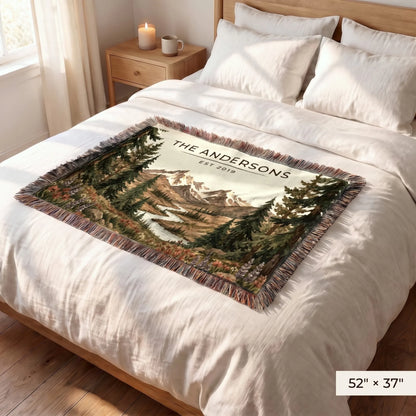 Mountain River Wildflower Woven Blanket 52x37 on a queen bed for size comparison