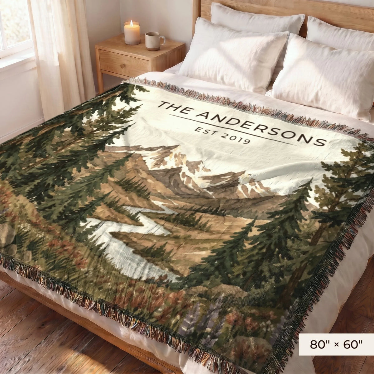 Mountain River Wildflower Woven Blanket 80x60 covering a queen bed