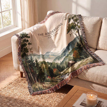 Great Smoky Mountains Cabin Woven Blanket draped over a sofa corner