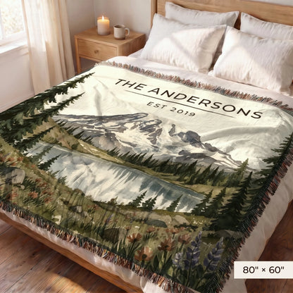 Mount Rainier Lake Woven Blanket 80x60 on a queen bed