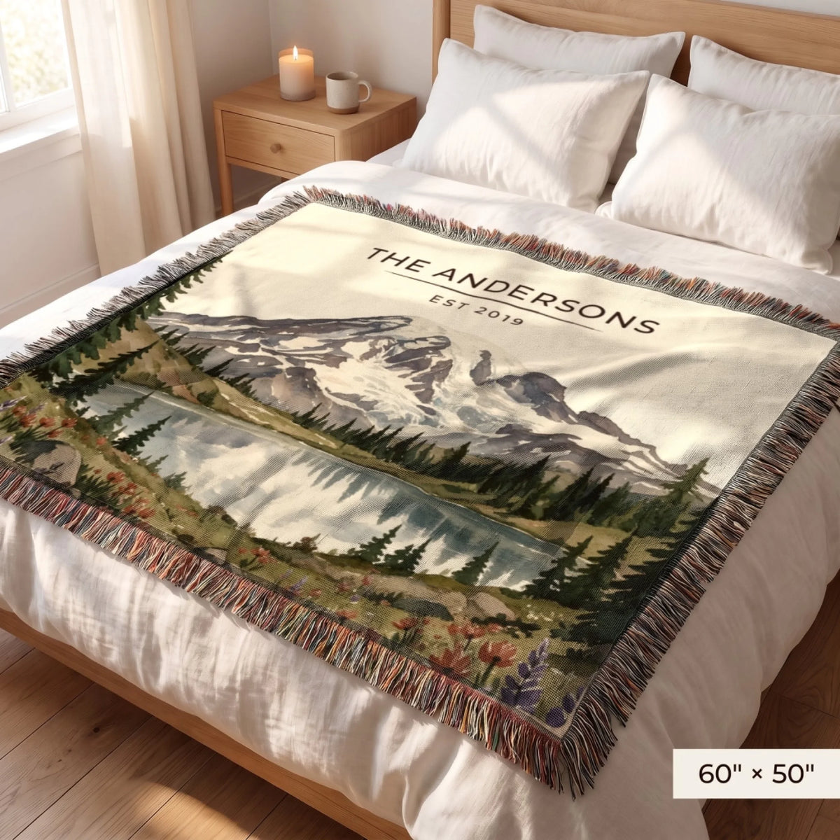 Mount Rainier Lake Woven Blanket 60x50 on a queen bed