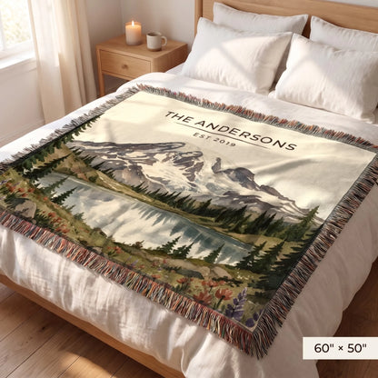 Mount Rainier Lake Woven Blanket 60x50 on a queen bed