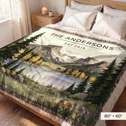 Rocky Mountain Lake Elk Woven Blanket 80x60 on a queen bed