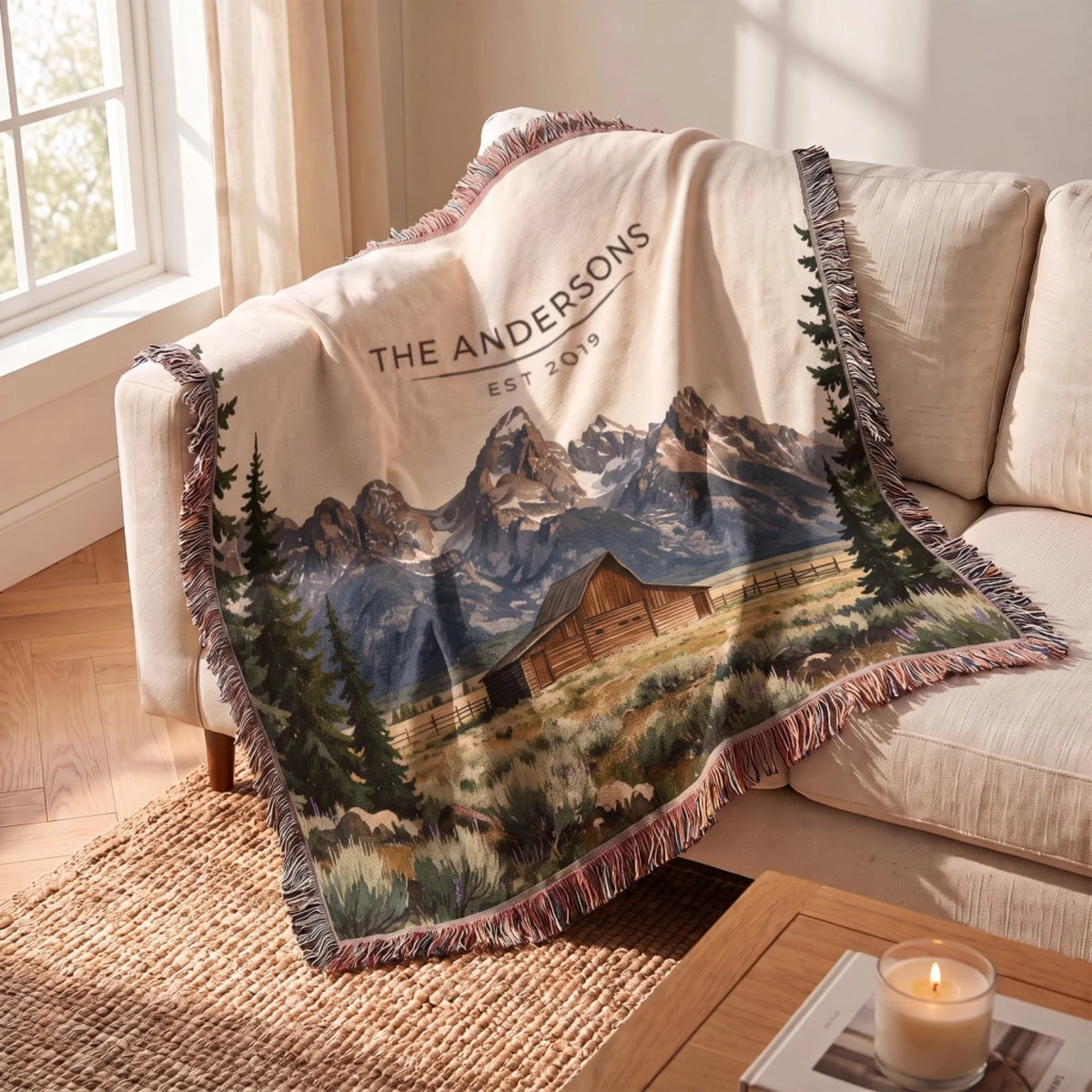 Grand Teton Barn Woven Blanket draped over a sofa