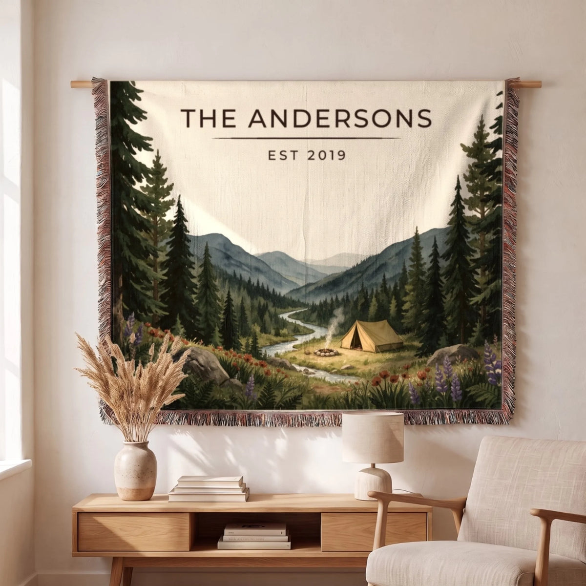 Personalized Forest Campsite Woven Blanket hanging on a wall, family name woven in