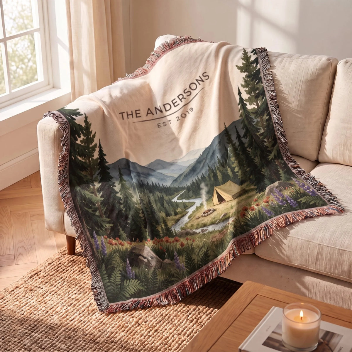 Forest Campsite Woven Blanket draped over a sofa