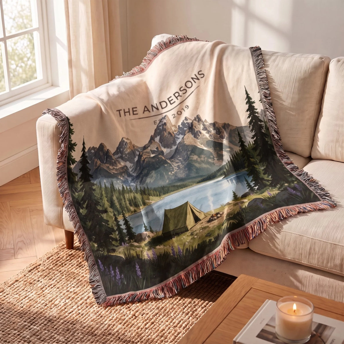 Grand Teton Lake Campsite Woven Blanket draped over a sofa