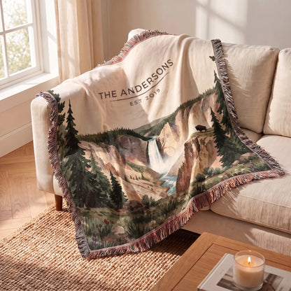 Yellowstone Falls Bison Woven Blanket draped over a sofa
