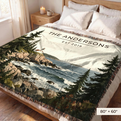 Acadia Lighthouse Coast Woven Blanket 80x60 on a queen bed