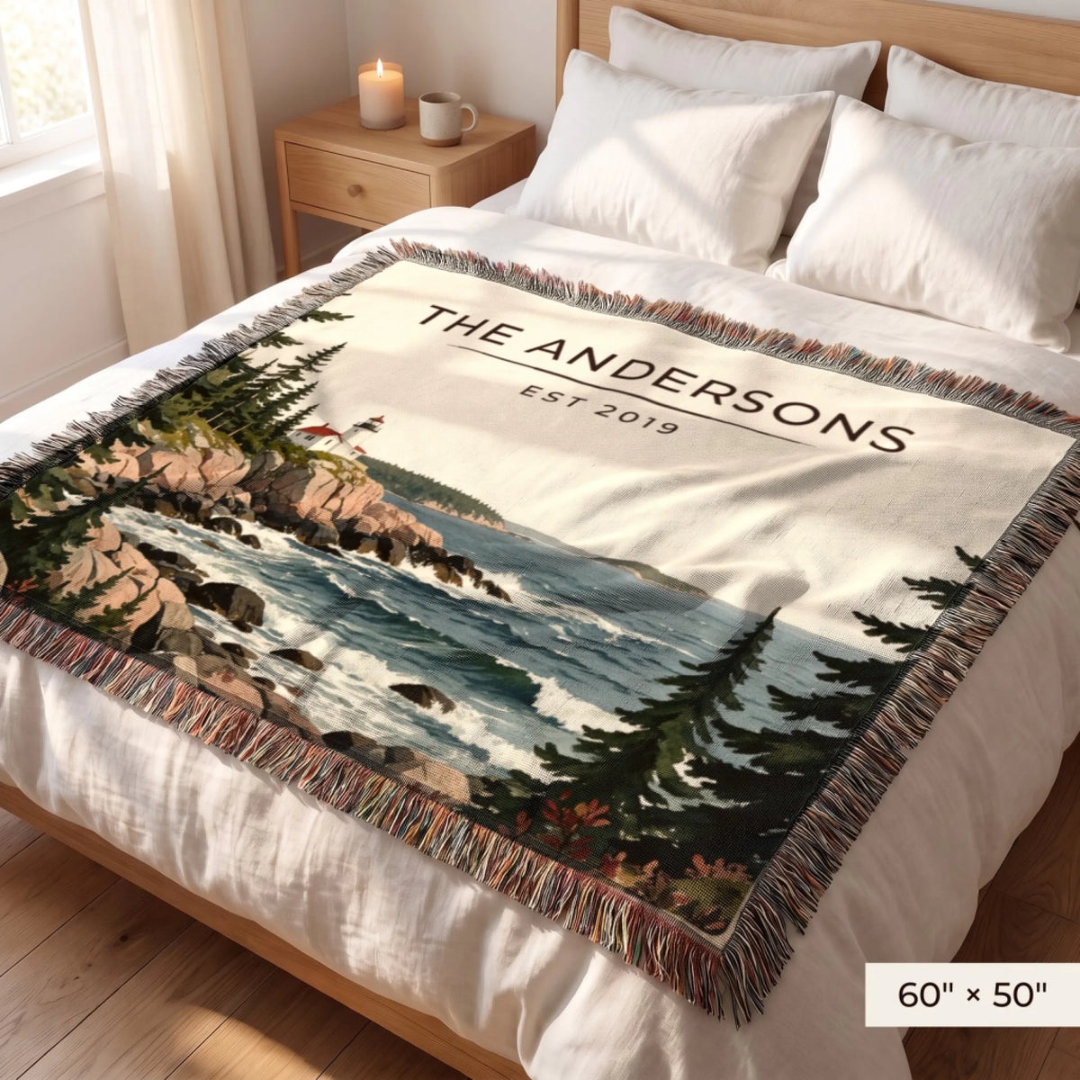 Acadia Lighthouse Coast Woven Blanket 60x50 on a queen bed