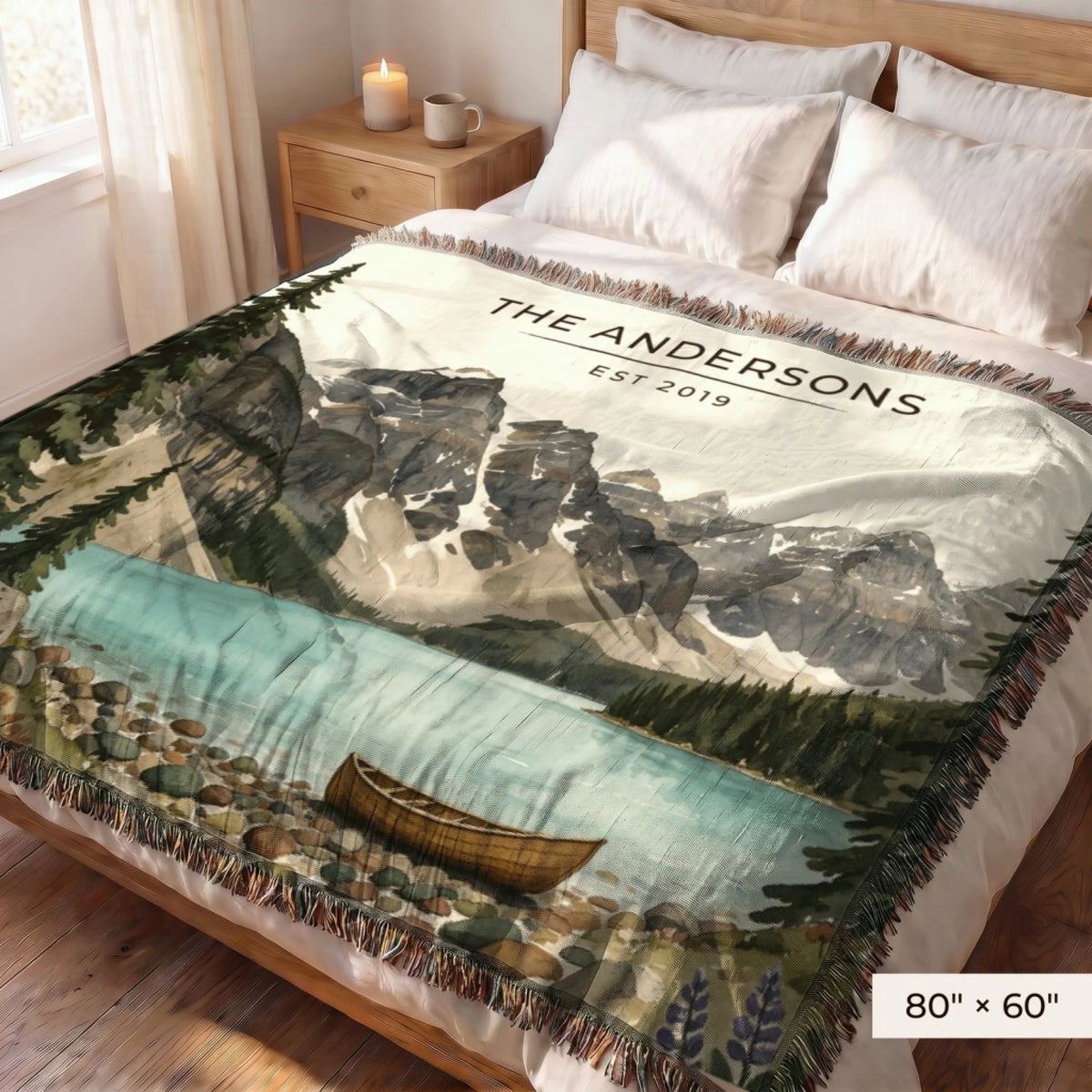 Glacier Lake Canoe Woven Blanket 80x60 on a queen bed