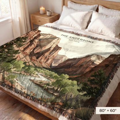 Zion Canyon River Woven Blanket 80x60 on a queen bed