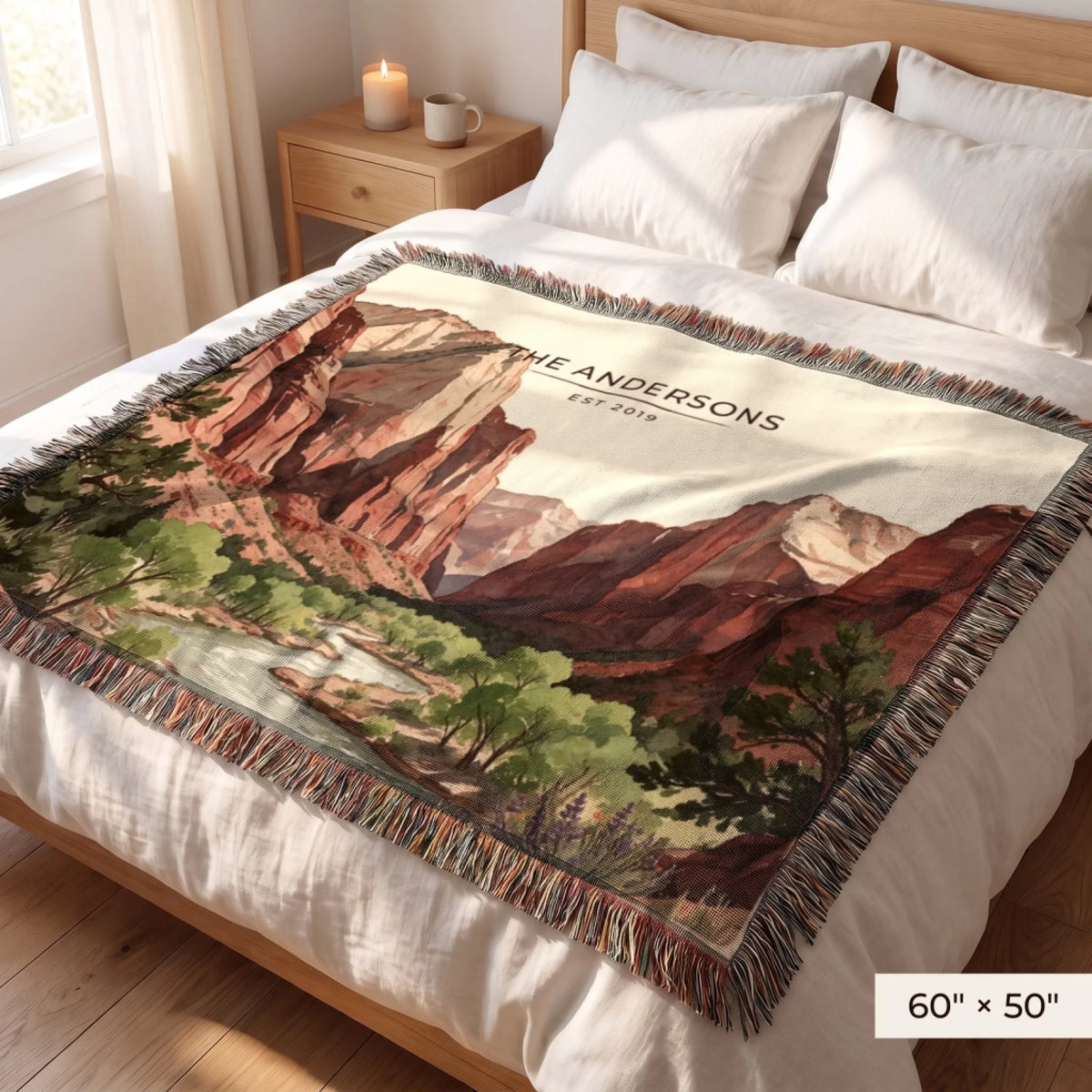 Zion Canyon River Woven Blanket 60x50 on a queen bed