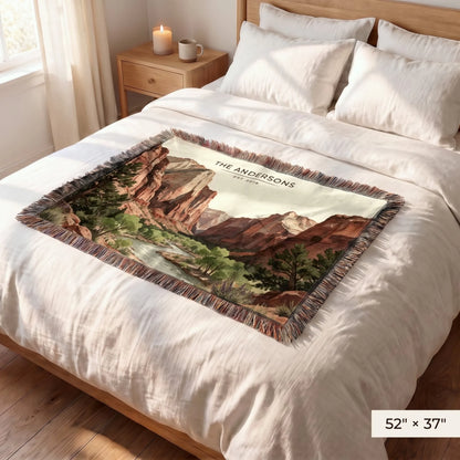 Zion Canyon River Woven Blanket 52x37 on a queen bed