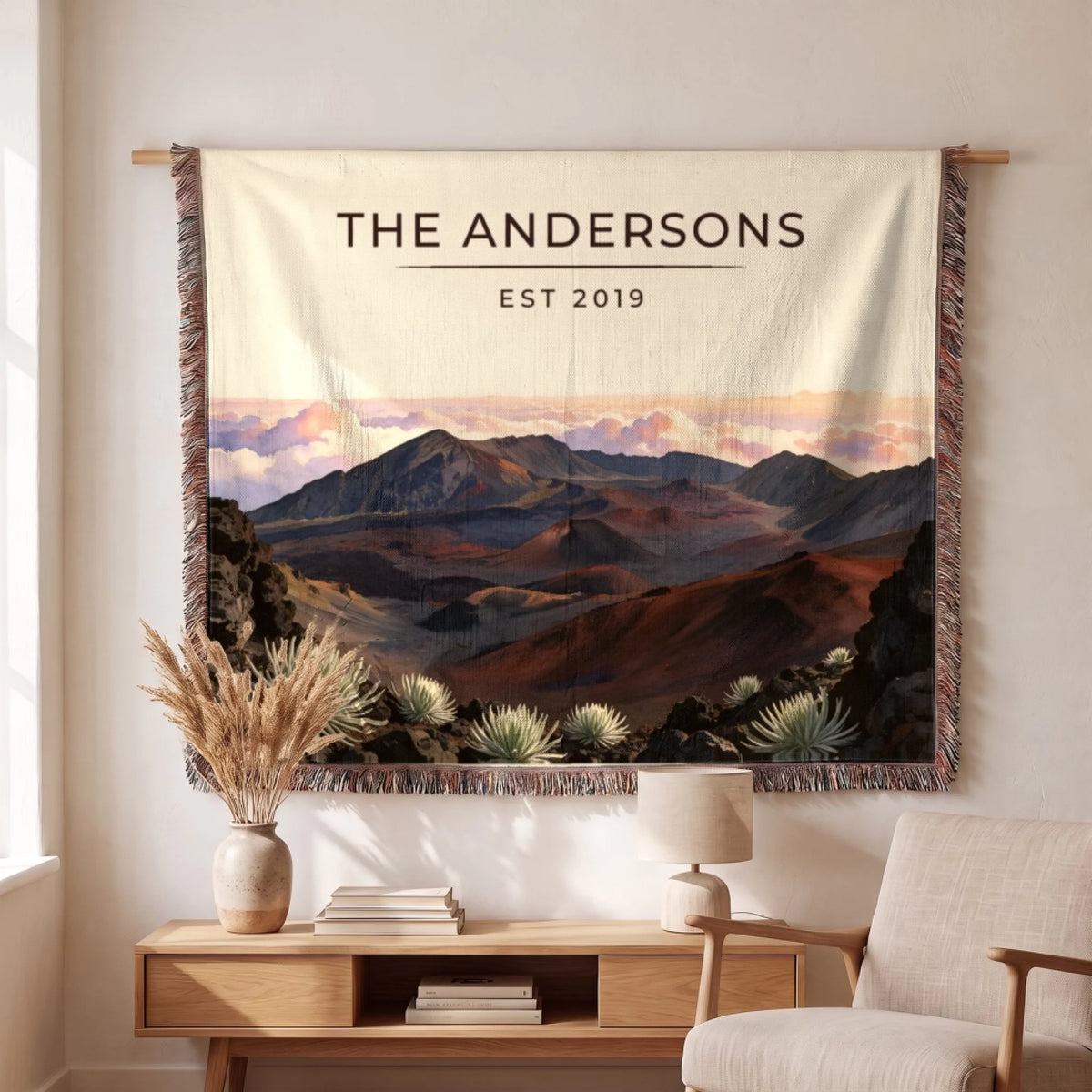 Personalized Haleakala Crater Sunrise Woven Blanket hanging on a wall, family name woven in