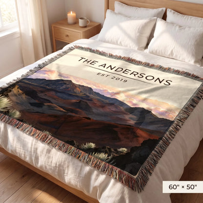 Haleakala Crater Sunrise Woven Blanket 60x50 on a queen bed