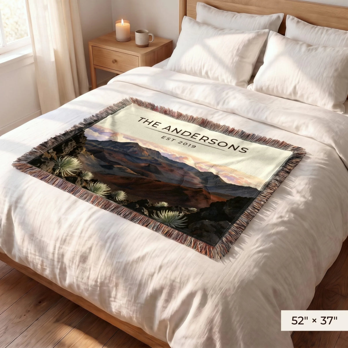Haleakala Crater Sunrise Woven Blanket 52x37 on a queen bed