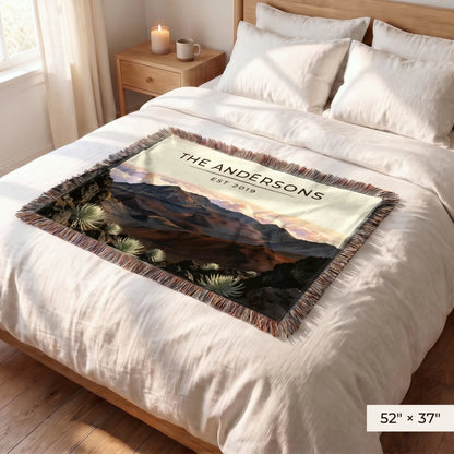 Haleakala Crater Sunrise Woven Blanket 52x37 on a queen bed