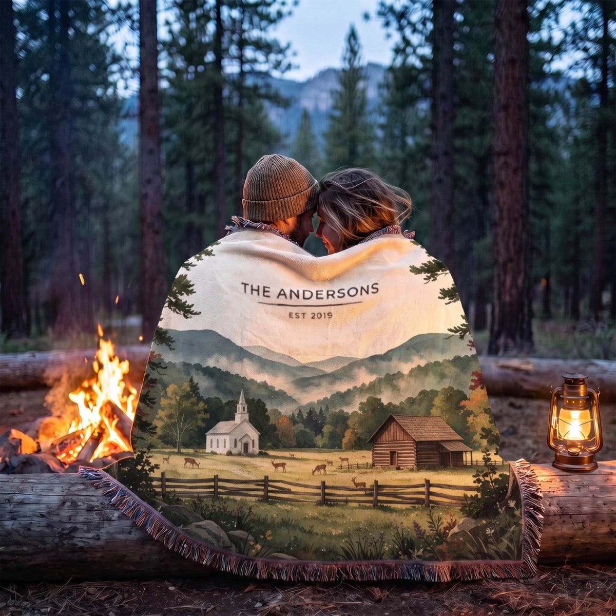 Couple wrapped in the Great Smoky Mountains Cades Cove Woven Blanket by a campfire