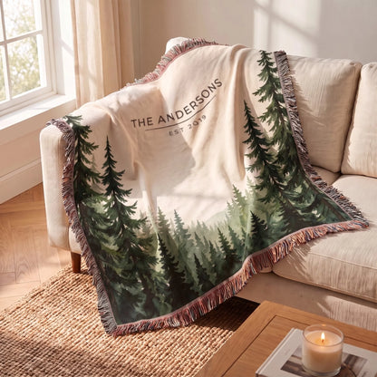 Evergreen Forest Treetops Woven Blanket draped over a sofa