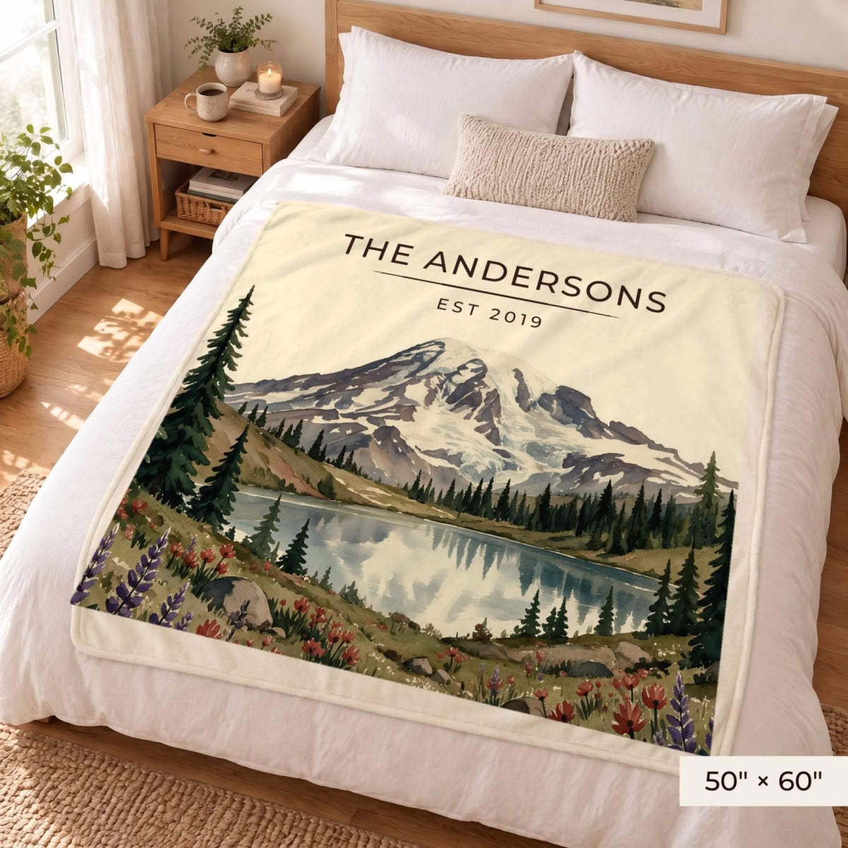 Mount Rainier Lake Sherpa Blanket 50x60 on a queen bed