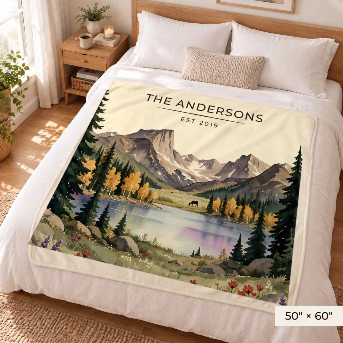 Rocky Mountain Lake Elk Sherpa Blanket 50x60 on a queen bed