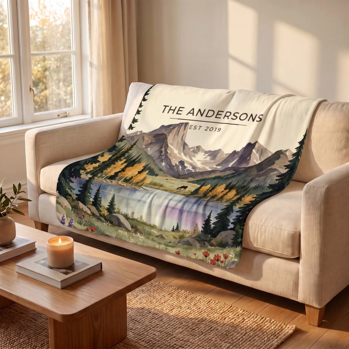 Rocky Mountain Lake Elk Sherpa Blanket draped over a sofa