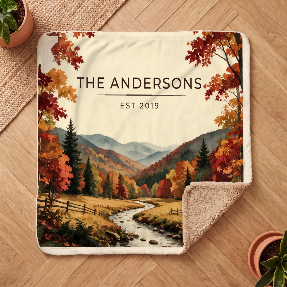 Personalized Great Smoky Mountains Autumn Sherpa Blanket on a wooden floor with the cozy sherpa back showing