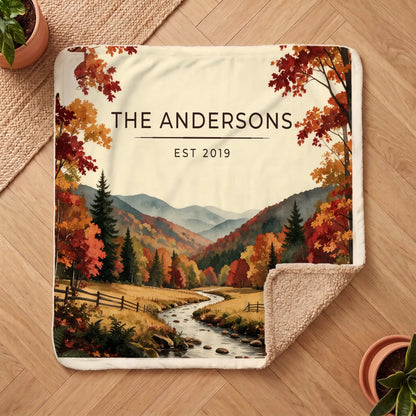 Personalized Great Smoky Mountains Autumn Sherpa Blanket on a wooden floor with the cozy sherpa back showing