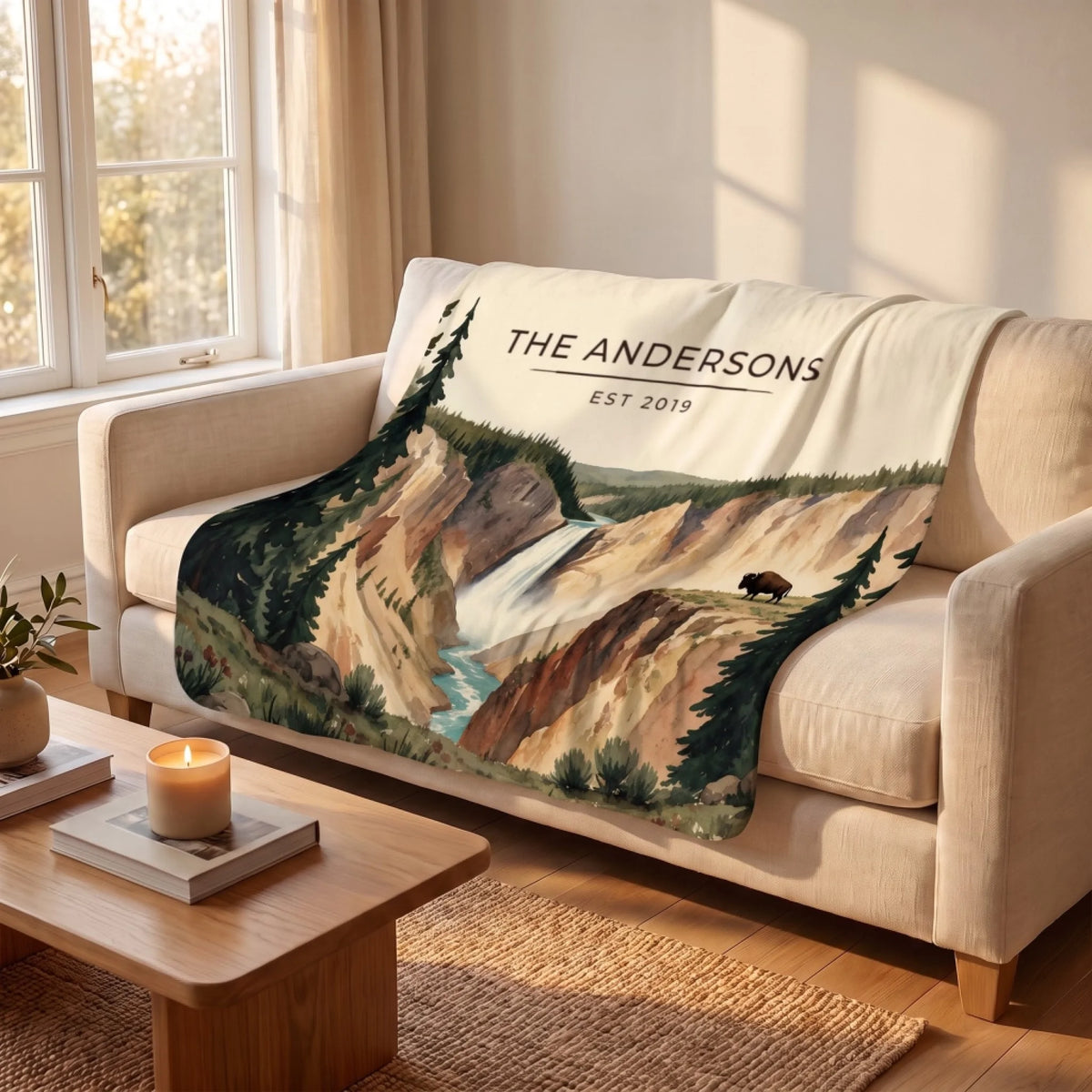 Yellowstone Falls Bison Sherpa Blanket draped over a sofa