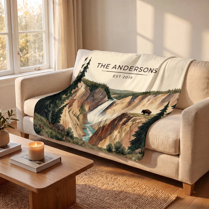 Yellowstone Falls Bison Sherpa Blanket draped over a sofa