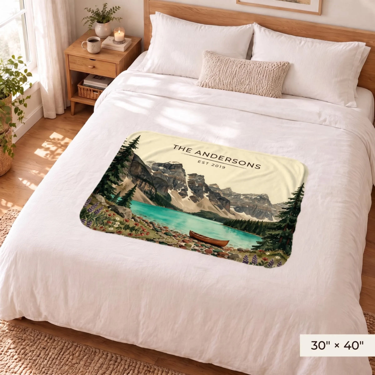 Glacier Lake Canoe Sherpa Blanket 30x40 on a queen bed